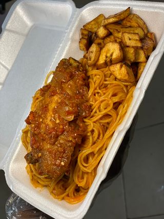 Jollof spaghetti , plantain and peppered turkey 
