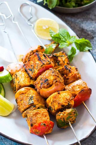 Paneer Tikka - Delicately Spiced coated cheese cooked in tandoor