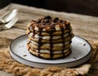 Tortita de tiramisú, café, crema mascarpone y virutas de cacao