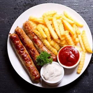 A pair of premium Chicken Sausages served with a large plate of chips 