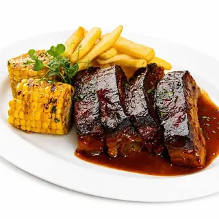 Coaste de porc in sos de BBQ, cartofi steak