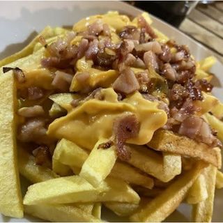 Papas locas papas fritas con jamón y queso