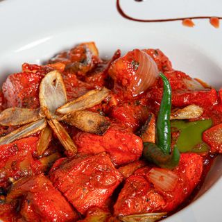 Bhuna al ajillo con champiñones y Chili Pollo