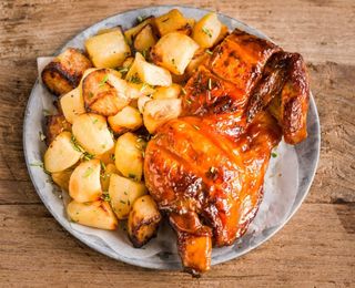 Mezzo pollo con patate