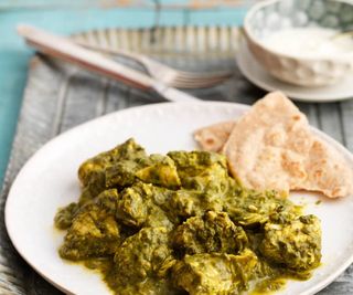 Saag pollo o agnello