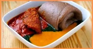 Amala served with Ewedu and Gbegiri mixed with shaki