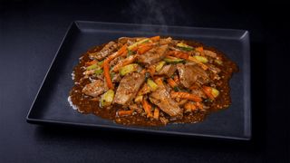 Limbă de porc în sos picant