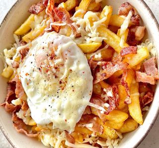 Sunny side up eggs and french fries