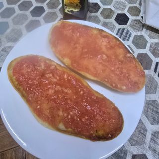 Tostada de tomate, aceite 
