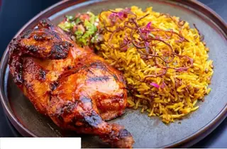 1/4Chicken with Chips and rice plus a Free Soda