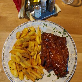 Scarita de porc cu sos Bbq la cuptor