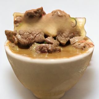 Solomillo con setas y curry