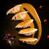 Гьoза с октопод и черен чесън (200г)