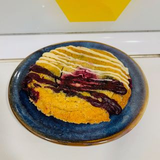 Cookie tarta de queso y grosellas