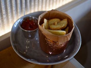 Картопля по селянські з томатним соусом (150g)