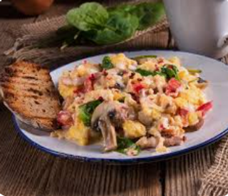 Revuelto De Hongos Y Jamón (Ración)