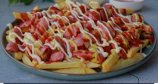 Ración De Salchipapas