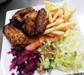 Piatto ali di pollo speziate