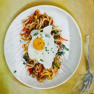 Wok udon noodles pollo cajun