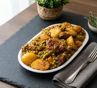 Lapin Sauté Aux Petits Pois Accompagné De Pain