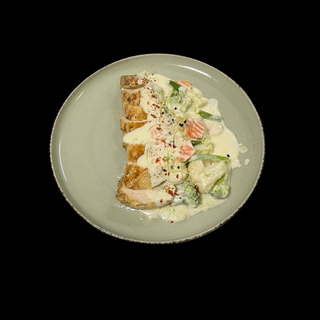 Стейк з курячого філе з овочами