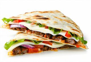 56. Piadina con kebab, verdure pomodoro, lattuga, cipolla,  barbecue