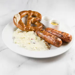 Knackwurste con contorno e brez n