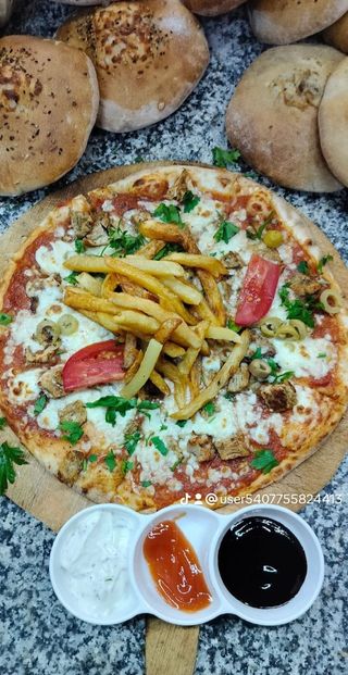 Pizza Escalope + frites gratuit