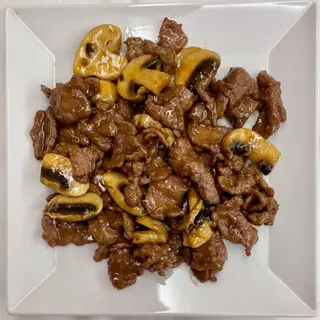 55. Ternera Con Champiñones