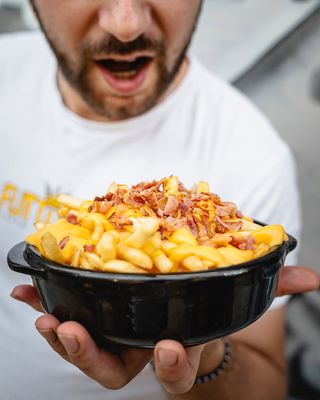 Patatine con bacon croccante e cheddar