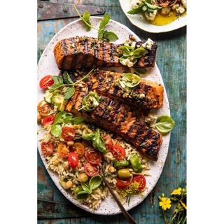 Grilled Fish served with  with greek salad & pasta