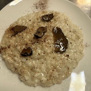 Risotto 4 formaggi con tartufo e polvere di boletus