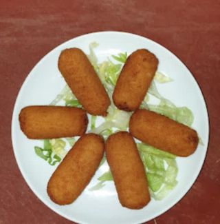 Porción De Croquetas De Cebolla 