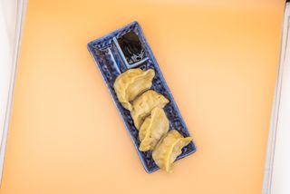 61 Ravioli a vapore con carne di maiale 4 pezzi