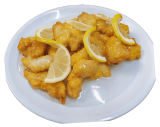 62-Pollo rebozado Con Salsa De Limón