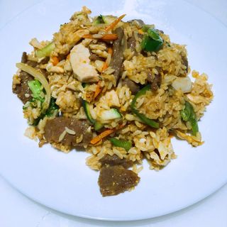 Arroz mixto pollo y ternera al salsa curry