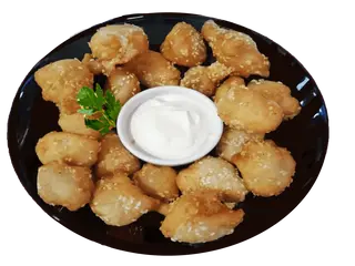 Сусамени пилешки хапки с чеснов сос (340г)