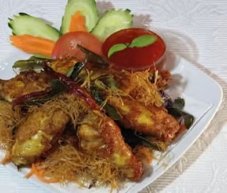 Pržena pileća krila marinirana u limunskoj travi