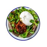 Burrata, valeriana e crema di pomodori secchi