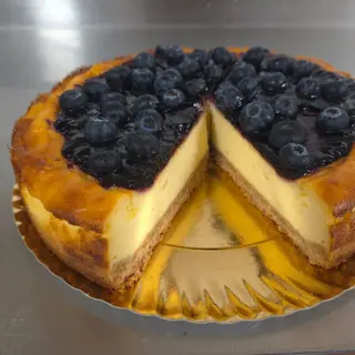 Tarta de queso con arándanos -porción