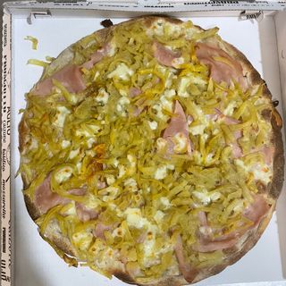 Pizza patate e prosciutto cotto