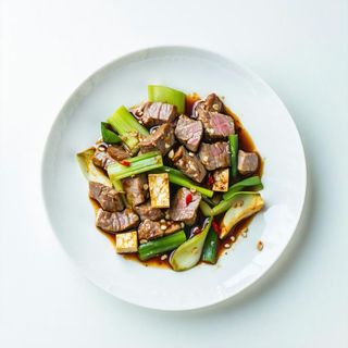 Maiale saltati con tofu secco