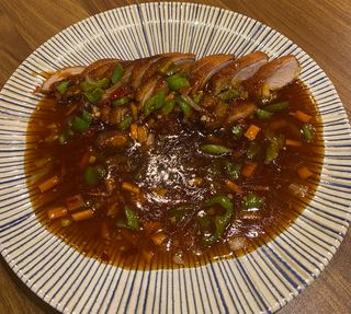 (61)Pato con salsa  Picante