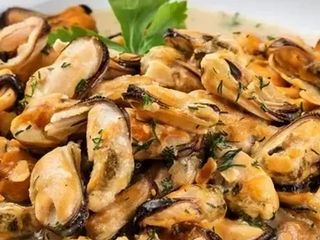 М'ясо мідій в часниковому соусі (200g)