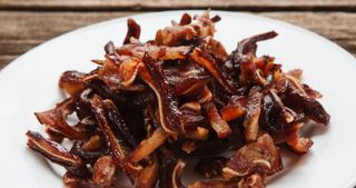 Вушка свинні обсмажені в соусі (200г)