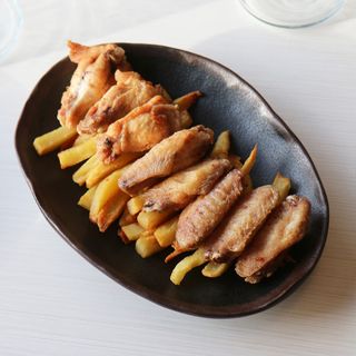 Ración De Alitas Y Muslitos De Pollo