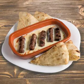 Pribojski ćevap u kajmak sosu 125g