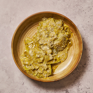 Flores de alcachofa con parmesano y yema trufada