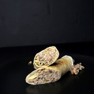 Млинці зі свининою та грибами