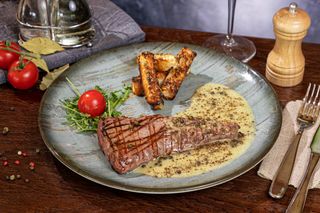 Muschi vitel in sos de piper verde